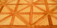 Pod intarzijski parket spadajo tudi ornamenti in bordure